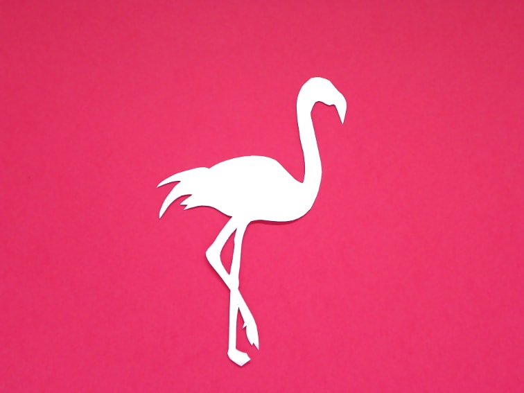 cartulina de color rosa y plnatilla de un flamenco para hacer un marcapaginas