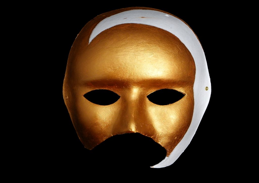 parte de la mascara veneciana pintada de color cobre metalizado