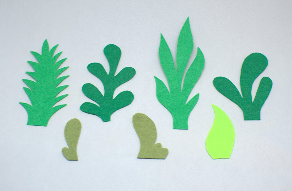 plantas de fieltro en colores verdes