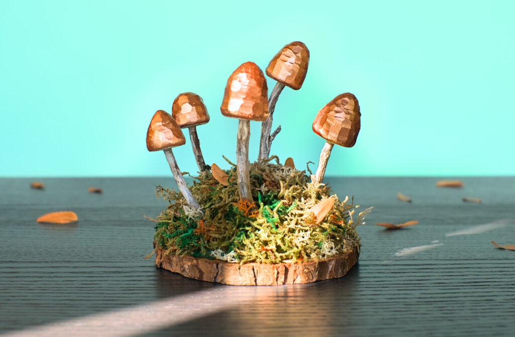 adorno de otoño para decorar la casa hecho con setas talladas en madera