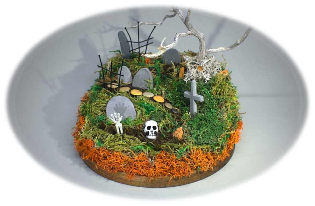 diorama de halloween de cementerio antiguo con lapidas de plastilina