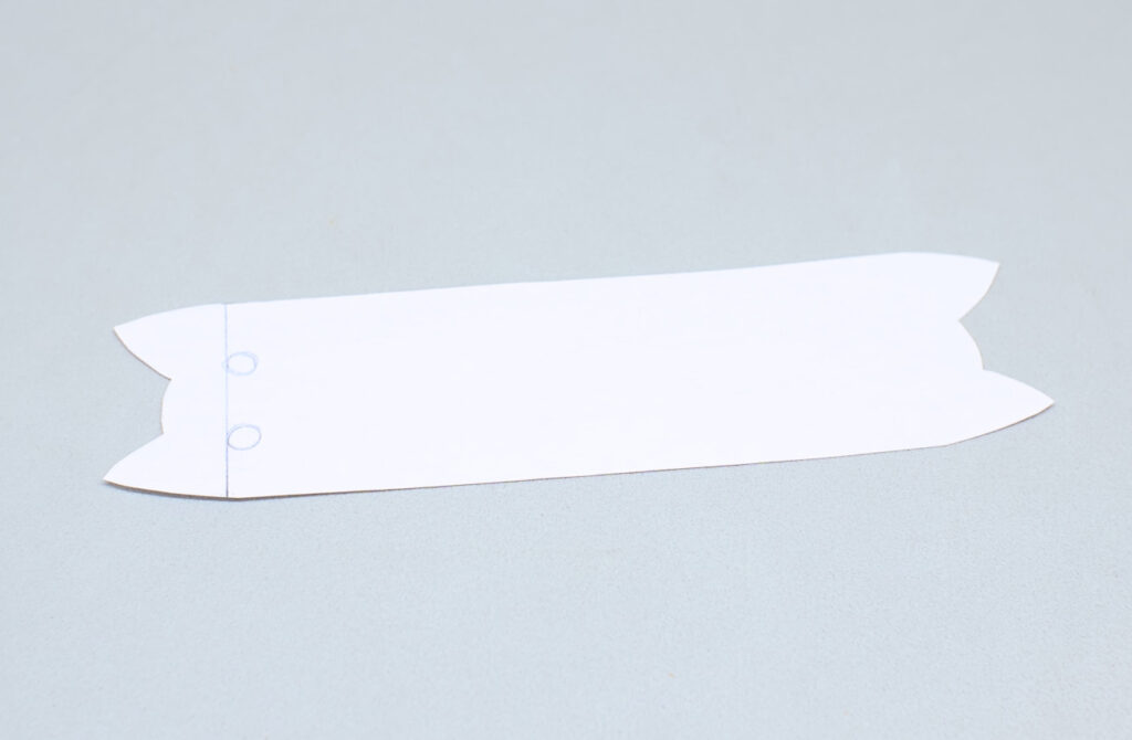 plantilla de papel con cabeza de gatito para hacer organizador de cables