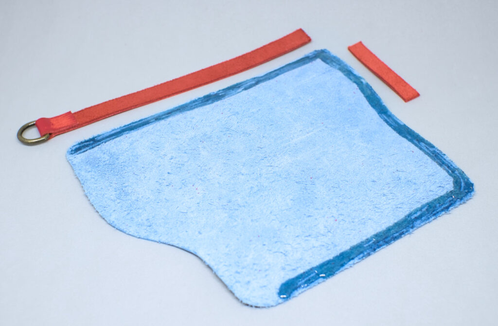 pieza de cuero para estuche de gafas con pegamento de contacto por el contorno