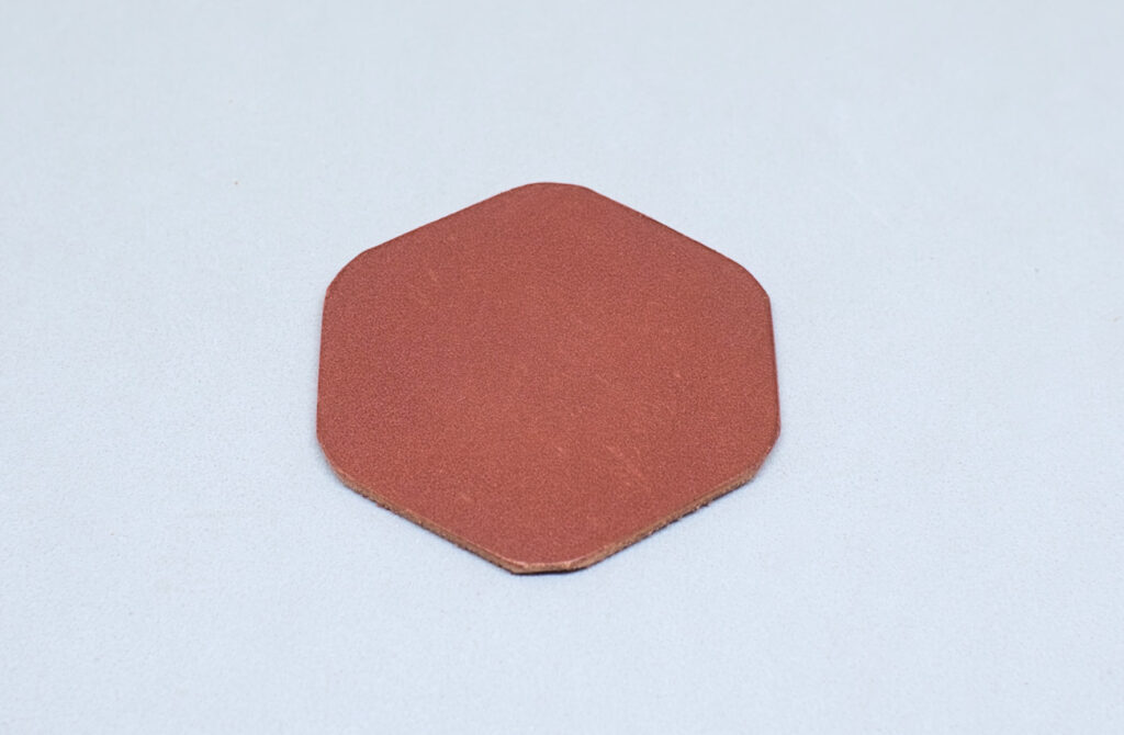 pieza de cuero hexagonal